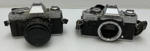 lot 123 image: Minolta X-370 & XG-M Camera Bodies One With Lens