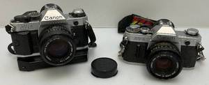 lot 125 image: Cannon AE-1 Program Camera & Cannon AT-1 Both With Lens