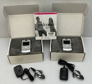 lot 132 image: Two T-Mobile Razr V3 Flip Phones With Original Box