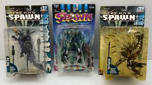 lot 144 image: Mcfarlane Toys Misc. SPAWN Action Figures (NIB) Packaging Beat Up A Little 1 Yellowing In Plastic Present