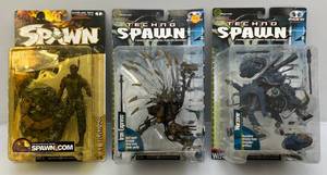 lot 162 image: Mcfarlane Toys Misc. SPAWN  Classics Action Figures  & Techno Spawn (NIB) Packaging Beat Up A Little  1 Yellowing In Plastic Bubble