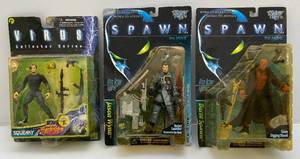 lot 165 image: Misc. Action Figures Including SPAWN & Virus (NIB) Cards Beat Up A Little (Yellowing In Plastic Bubbles)
