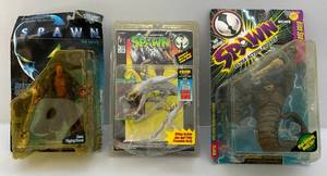 lot 166 image: Todd Toys & Mcfarlanes SPAWN Action Figures (NIB) Cards Beat Up A Little 1 Yellowing In Plastic Bubble