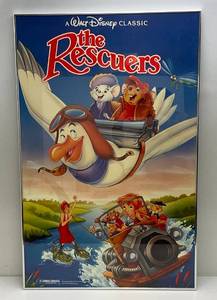 lot 209 image: 1977 Walt Disneys Classic (The Rescuers) Movie Poster Framed Behind Glass With Brushed Aluminum Frame 25 x 39 14