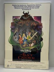 lot 215 image: Vintage Walt Disneys Pictures Presents (The Black Cauldron) Movie Poster Framed Behind Glass With Brushed Aluminum Frame 27 14 x 40 14