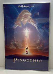 lot 219 image: Vintage Walt Disneys Classic (Pinocchio) Movie Poster Framed Behind Glass With Brushed Aluminum Frame 27 14 x 40 14