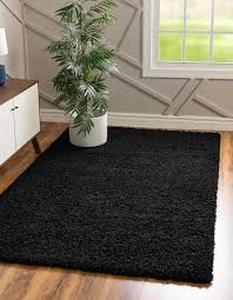 lot 40 image: Unique Loom Solid Shag Jet Black 4 ft. x 6 ft. Area Rug Customer Returns See Pictures