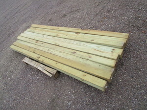 lot 9 image: (9) Pressure Treated 8 4x4s