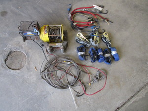 lot 28 image: 12v ATV Winch & Ratchet Straps