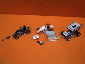 lot 109 image: (3) 118th GMP Collectibles Sprint Cars (some broken pcs)