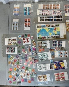 lot 63 image: Lot of Vintage & Modern U.S. & Worldwide Miniature Stamps  Unused & Used  Collectors Mix
