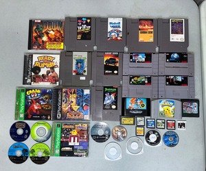 lot 113 image: Vintage Video Game Lot - NES, SNES, Sega, PlayStation, DS, UMDs - Over 30 Games