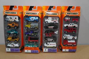 lot 30 image: 4 5-Packs Matchbox MBX Metal Cars