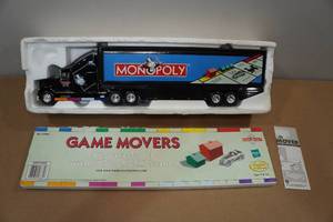 lot 90 image: Vintage Monopoly Game Movers Die-Cast Truck with Game