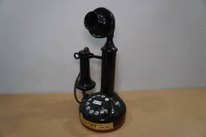 lot 138 image: Vintage Jim Beam Whiskey Candle Stick Phone Decanter