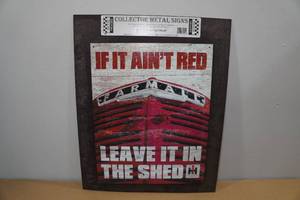 lot 211 image: Metal Farmall Sign