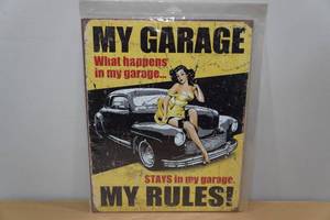 lot 214 image: Metal Garage Sign