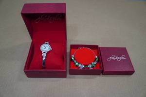 lot 229 image: Glam Glow Breast Cancer Ribbon Watch and Charm Bracelet