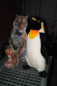 lot 287 image: Metal Tiger, Tiger Themed Table and Plush Penguin