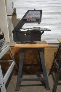 lot 4 image: Craftsman 10 Band saw with stand and manual