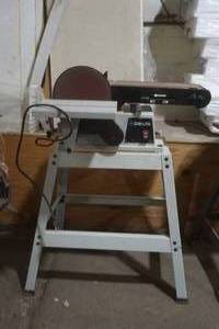 lot 5 image: Delta belt and disk sander with manual and extra sandpaper