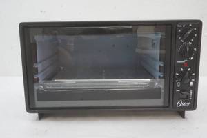 lot 106 image: Oster Toaster Oven Appears New