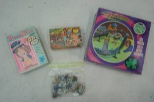lot 127 image: Vintage Jigsaw Puzzles Disney, PuzzNiks, and Johnny Lightning