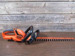 lot 61 image: BLACKDECKER 20V MAX 22in. Cordless Battery Powered Hedge Trimmer (Tool Only)