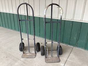 lot 130 image: Lot of 2 Pneumatic-Tired Hand Trucks  Functional and Versatile