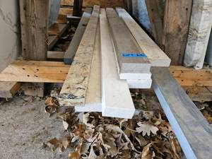 lot 124 image: Miscellaneous Lot of Quartz and Granite Countertop Pieces  Variety of Styles and Sizes