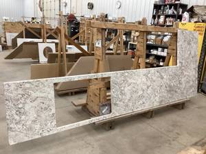 lot 108 image: New L-Shaped Wilsonart HD Laminate Countertop in Spring Carnival  Never Installed