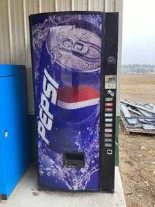 lot 103 image: Dixie Narco Pepsi Vending Machine  Reliable & Profitable Beverage Vending Solution