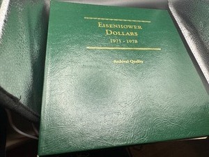 PARTIALLY FILLED EISENHOWER DOLLAR BOOK, ALL NICE - SOME UNCIRC & PROOF (17 COINS)