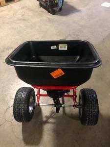 Everbilt 130 lbs. Tow Broadcast Spreader    Customer Returns See Pictures