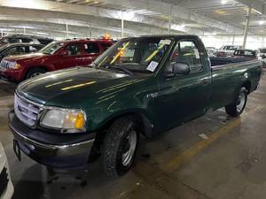 lot 12 image: 1999 Ford F-150 XL Long Box 2WD...LOW MILES