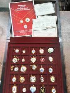From the Danbury Mint Chest Of Porcelain Pendants From The Finest Porcelain Makers-25 Pendants Chest 14x15