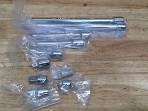 lot 52 image: Craftsman 10 Piece Extension and Adapter Set Model # CMMT53003