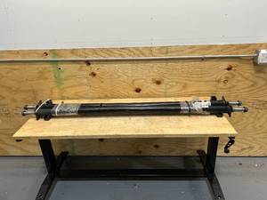 lot 143 image: Ultra-Tow Lot of 2- 3500-Lb. Capacity Spring Trailer Axles, 66 12in. Hubface, 54in. Spring Center, 71 34in.L, Straight