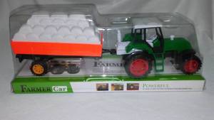 Farmer Car Tractor With Hay Trailer.