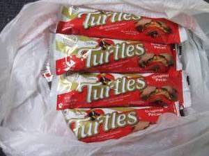 lot 58 image: 12- 1.76 oz Turtles...