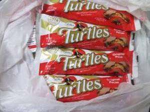lot 59 image: 12- 1.76 oz Turtles...