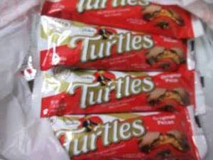 lot 61 image: 12- 1.76 oz Turtles...
