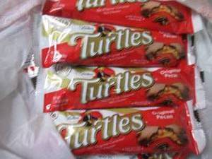 lot 62 image: 12- 1.76 oz Turtles...