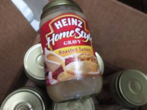 lot 75 image: 11- 12 oz Heinz Home Style Roasted ...