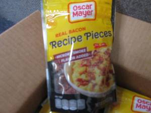 lot 79 image: 6- 2.8 oz Oscar Mayer Bacon Pieces...
