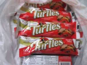 lot 102 image: 12- 1.76 oz Turtles...