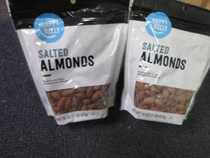 lot 131 image: 2- 16 oz Happy Belly Salted Almonds...