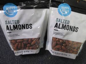 lot 132 image: 2- 16 oz Happy Belly Salted Almonds...