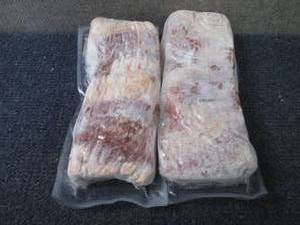 lot 203 image: CC 2- 1.5 lb l FROZEN Thick Cut Bac...