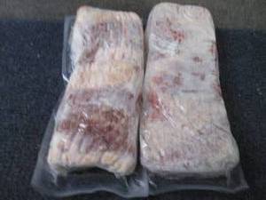 lot 204 image: CC 2- 1.5 lb l FROZEN Thick Cut Bac...